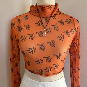 Orange Graphic Long Sleeve Top